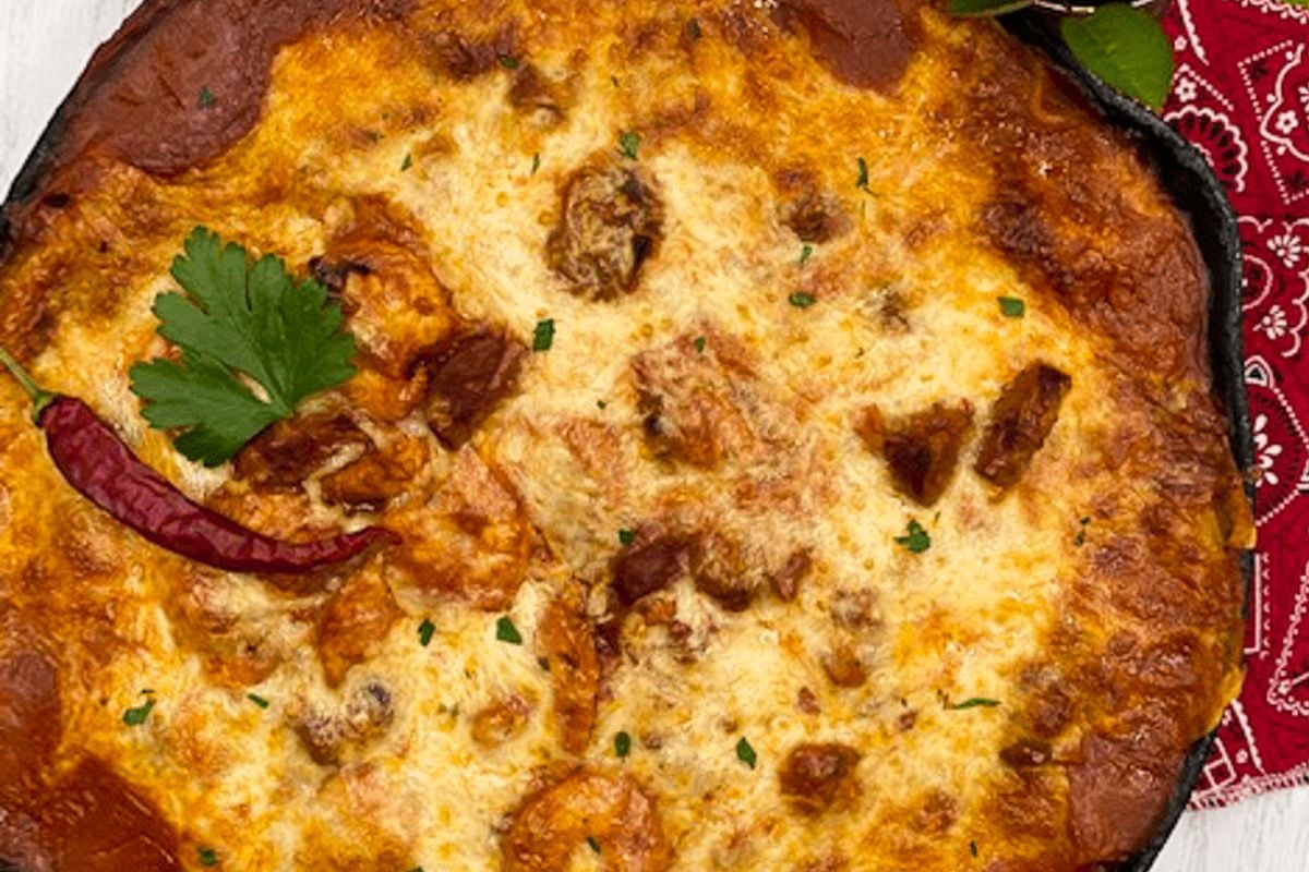 Cajun lasagna in a black pan. 