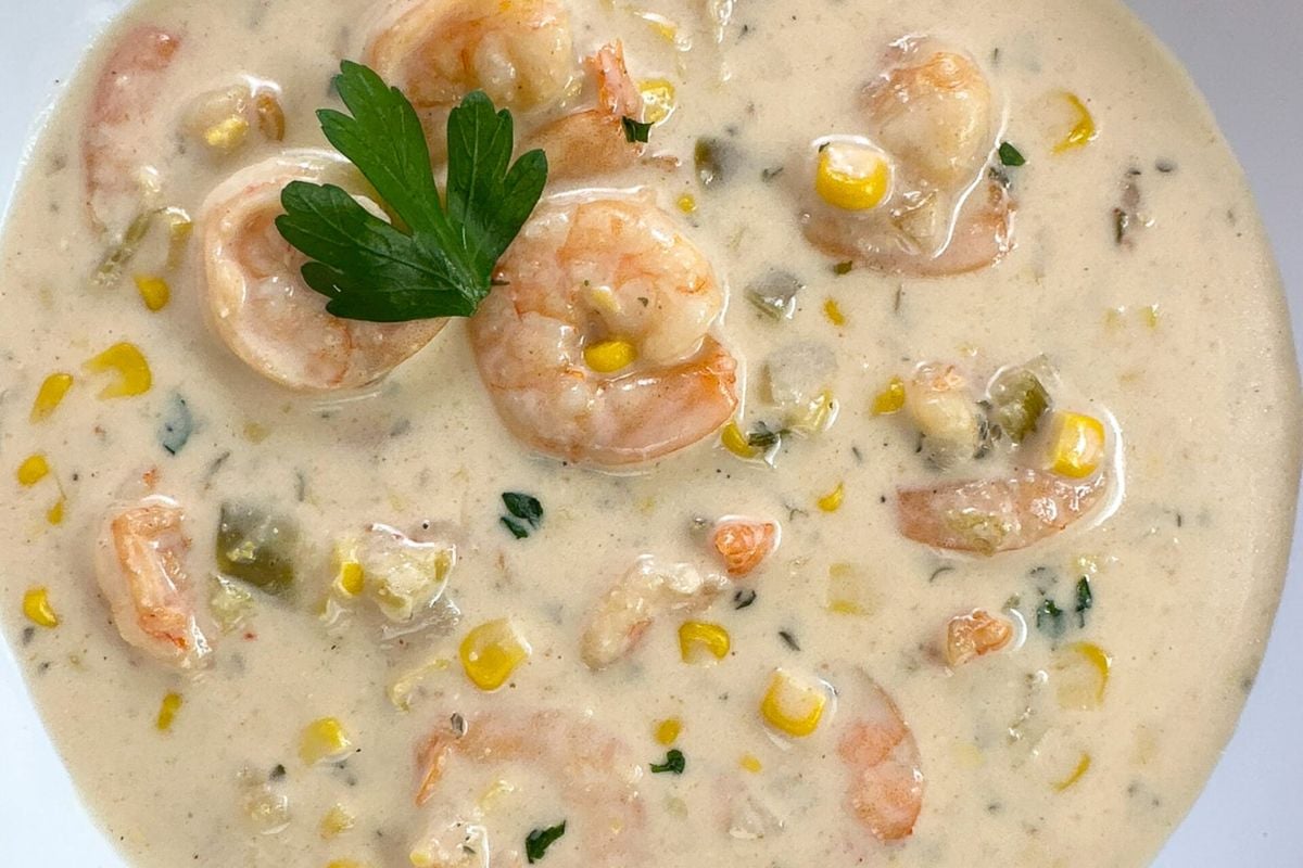 Shrimp and corn bisque closeup image in bowl.