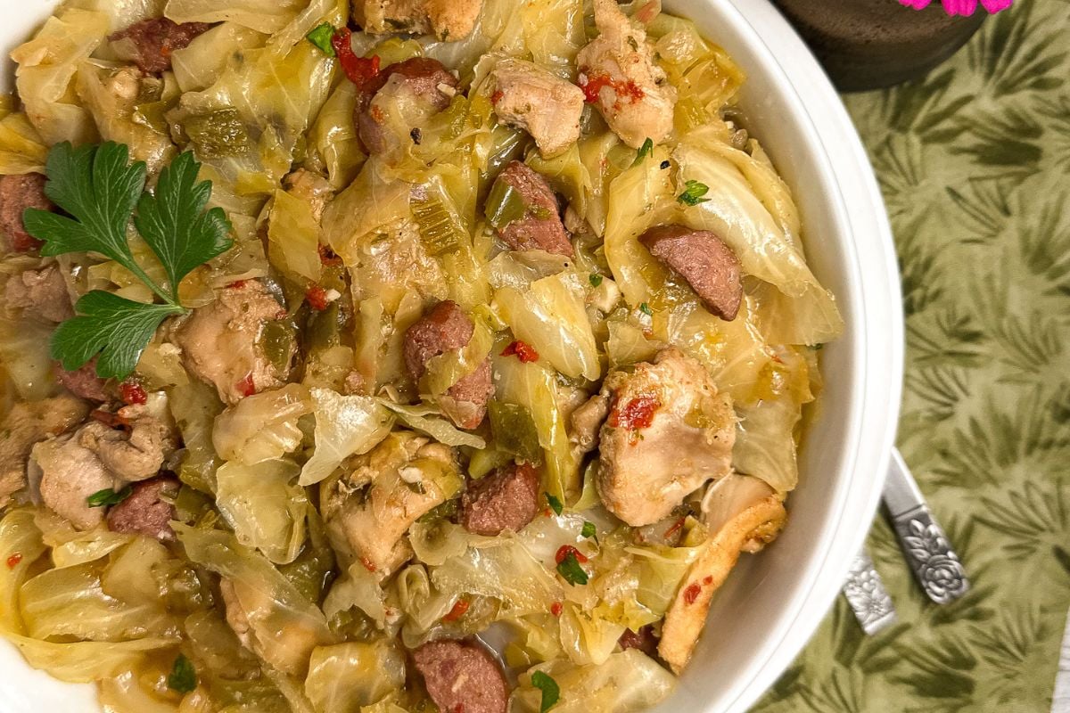 Cajun smothered cabbage with chicken and sausage.