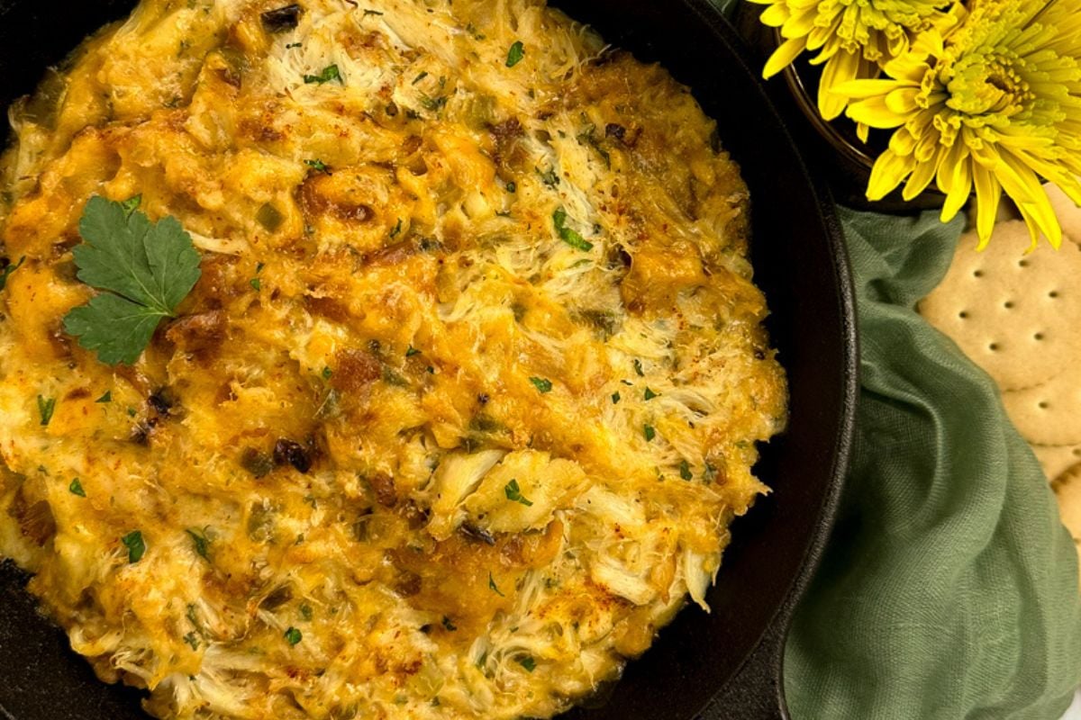 Cajun crab au gratin in a cast iron Dutch oven.
