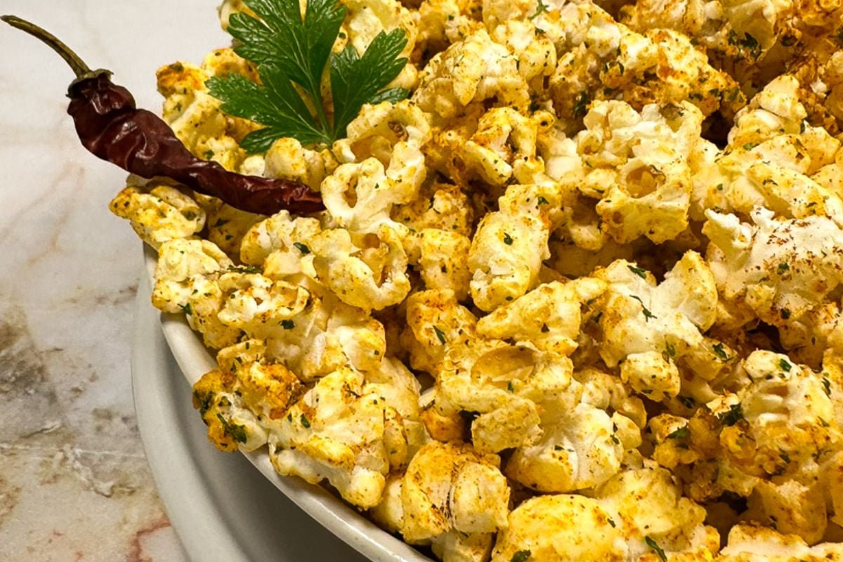 Cajun popcorn in a white bowl.