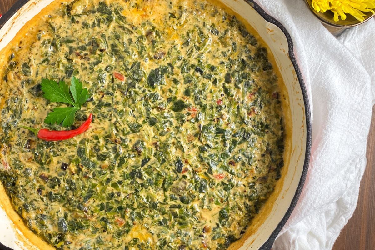 Cajun creamed spinach in a skillet. 