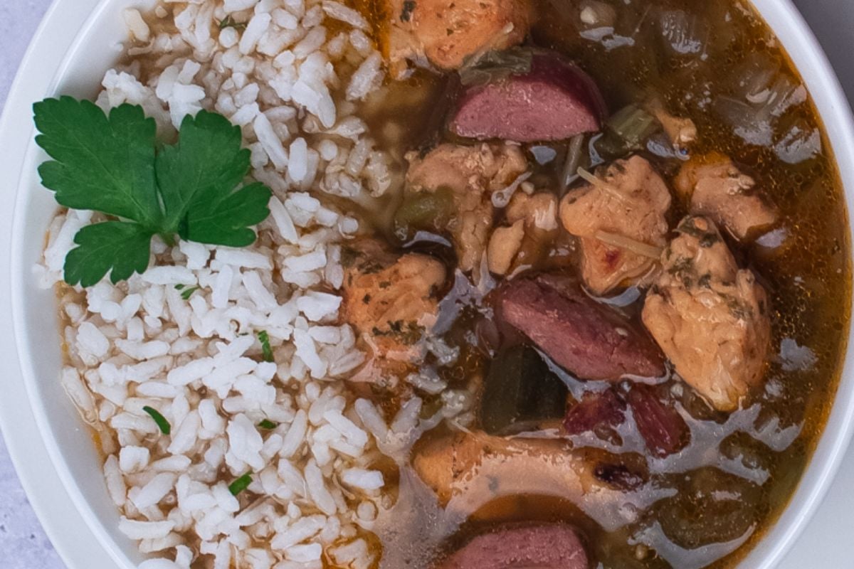 Closeup of Cajun chicken and sausage gumbo in a bowl. 