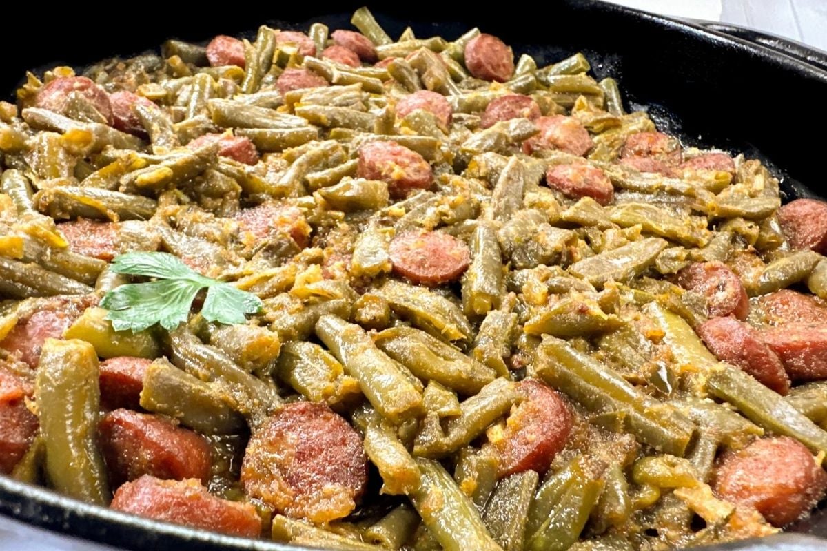 Cajun smothered green beans with sausage.