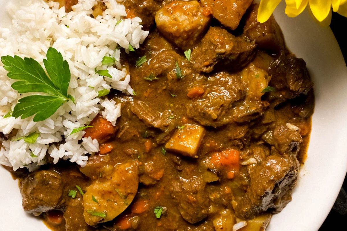 Cajun beef stew with rice in a bowl.
