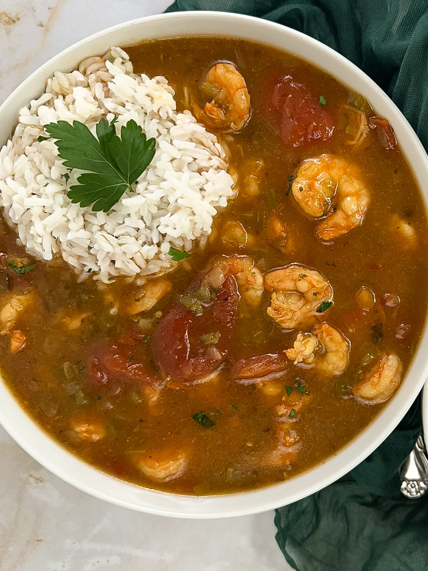 A closeup image of shrimp etouffee in a bowl.